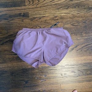 Purple Nike shorts